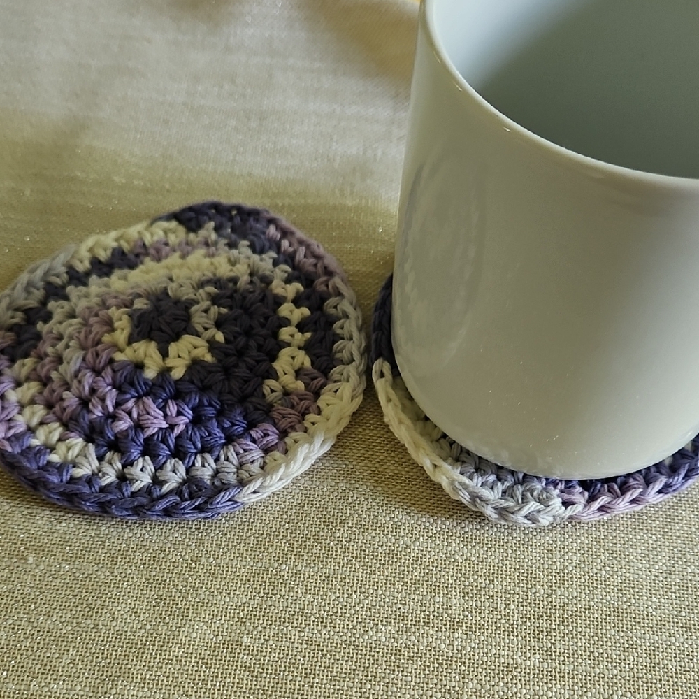 Set Of 2 Purple and White Crochet Coasters